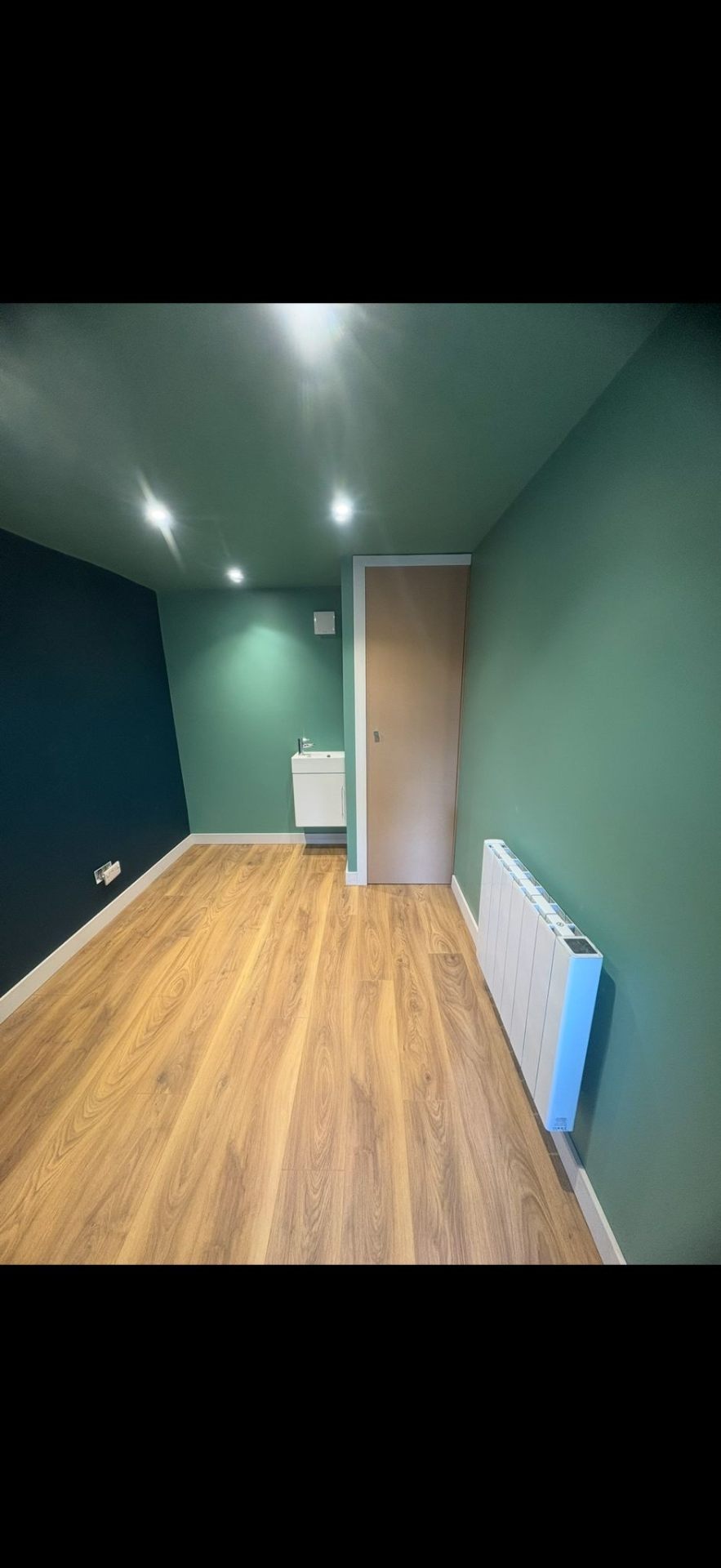 Composite decking installation with new lawn by Burton Builds landscaping team